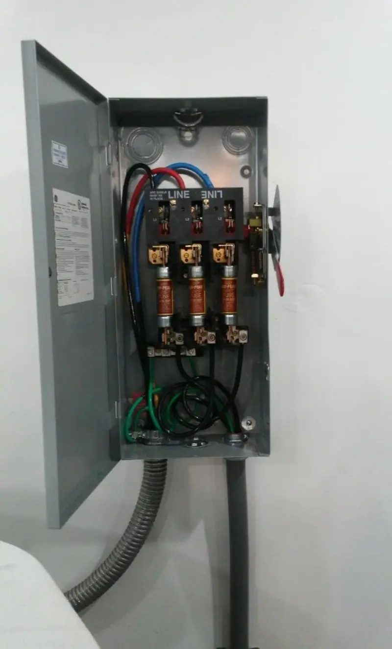 Three-phase disconnect switch installed for Smoke Detector Installation in Dawson